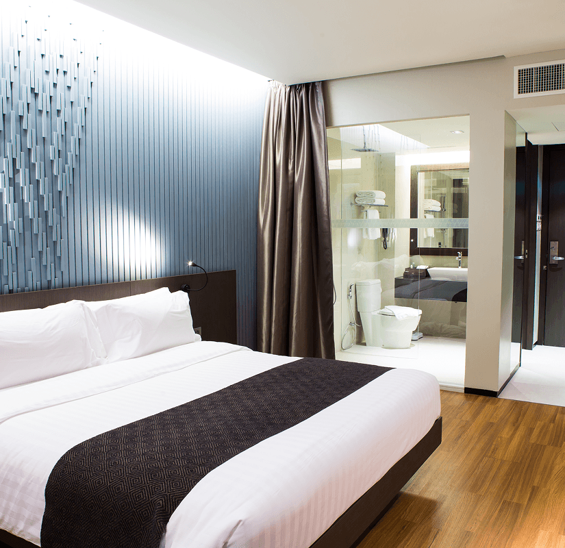 Elegantly designed hotel room with open bathroom view
